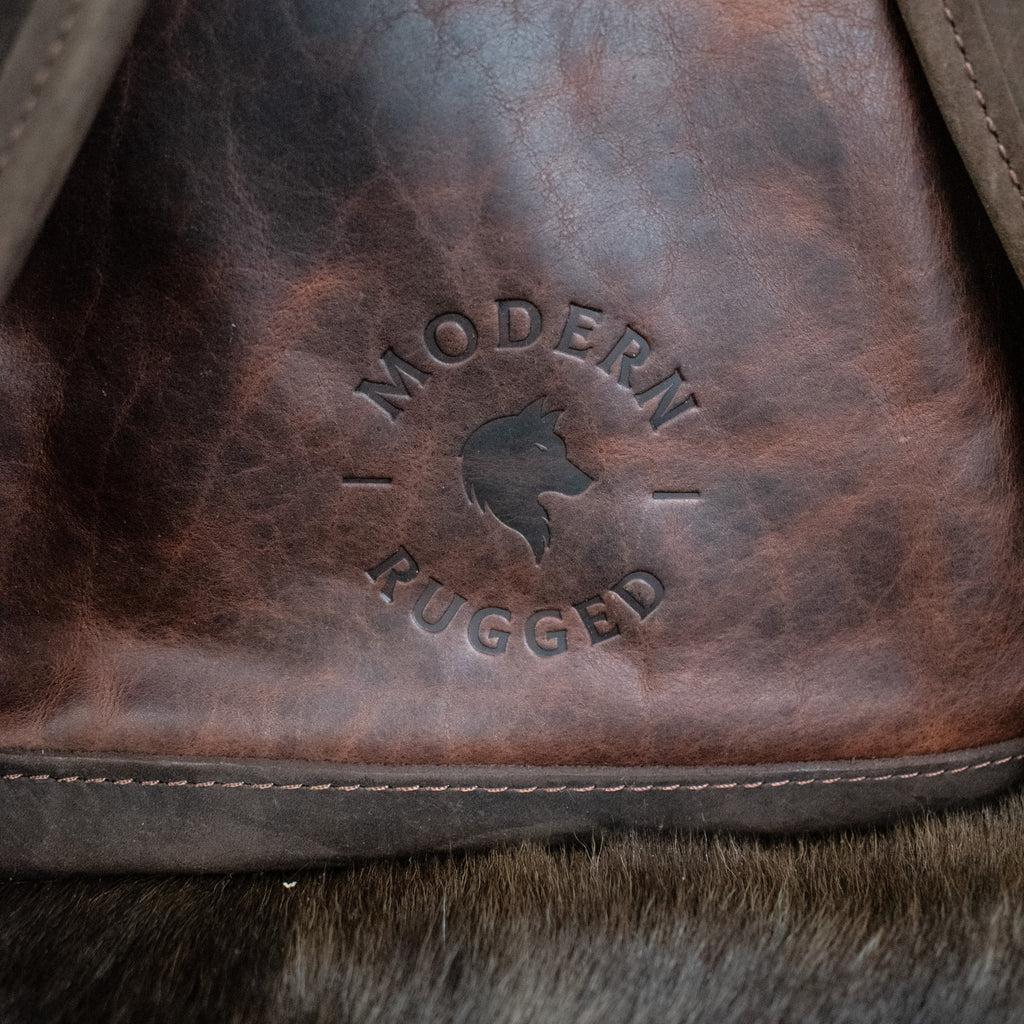 Leather Hide Backpack - Mahogany and Brown (Rustic) leather backpack with Modern Rugged logo 