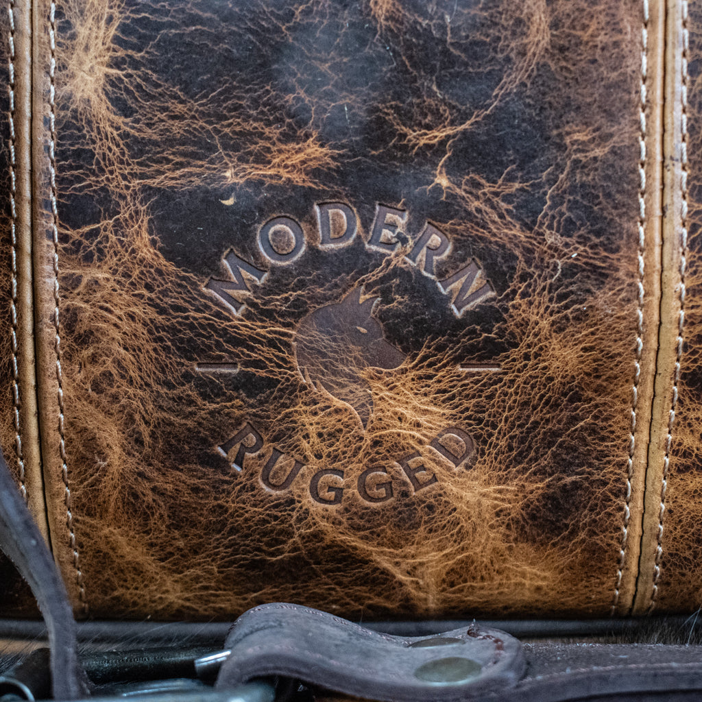 Rustic chestnut and dark brown buckled laptop bag from Modern Rugged