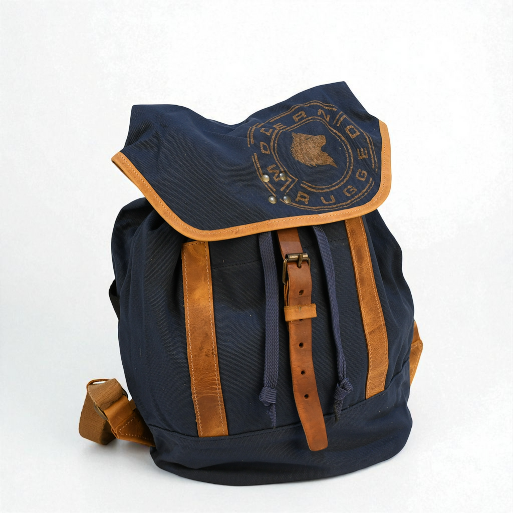 Navy blue backpack with brown straps and accents on a white background